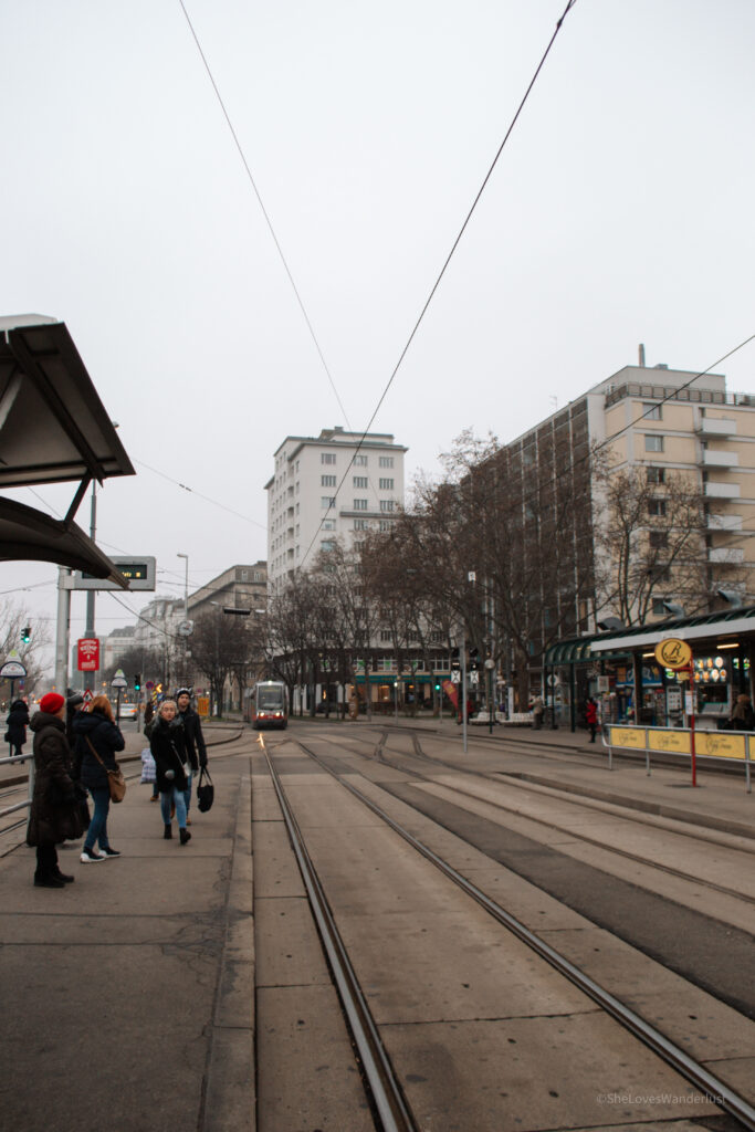 a street with a tram on it in Vienna, Austria